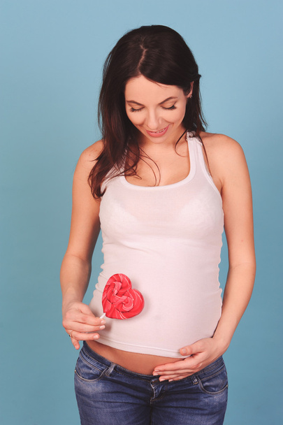 Felice donna incinta - Foto, immagini