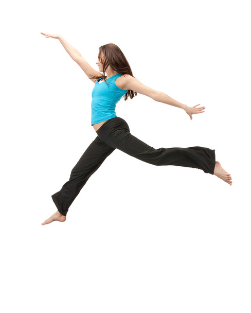Jumping sporty girl - Фото, изображение
