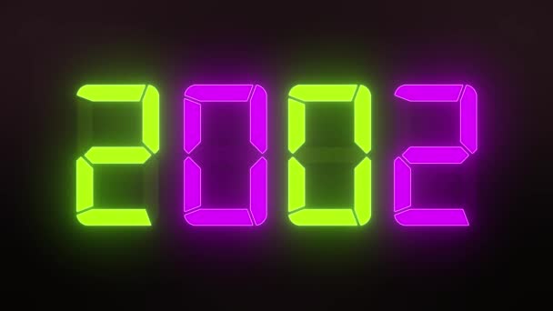 Videoanimation einer LED-Anzeige in Grün und Magenta mit den kontinuierlichen Jahren 2000 bis 2023 auf dunklem Hintergrund - stellt das neue Jahr 2023 dar - Urlaubskonzept - Filmmaterial, Video