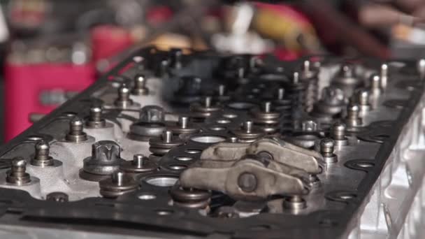 Mechanic Covers Valve Of Car Engine In Repair Shop Footage. - Footage, Video