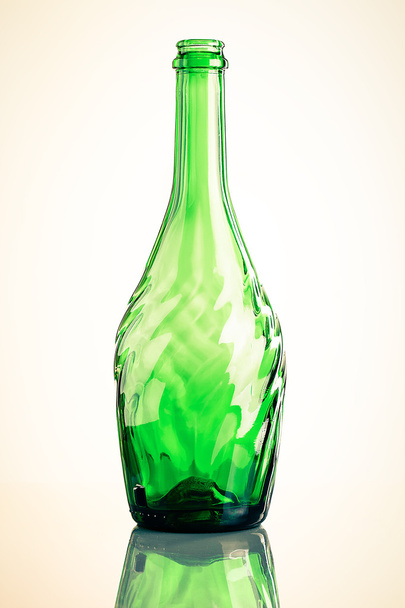 empty carved glass bottle with reflection - Foto, Imagem