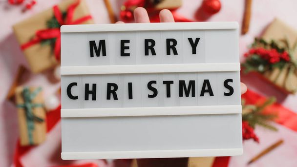Christmas background with presents packages flat layer shoot. - Photo, image