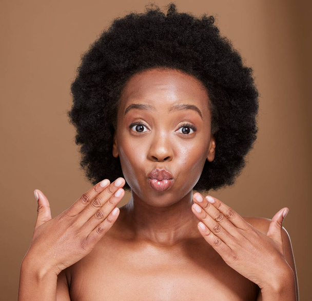 Black woman, beauty and skincare, pout and lips botox and aesthetic cosmetics on studio background. Portrait of young african girl, lip filler and kissing face, plastic surgery and facial treatment. - 写真・画像