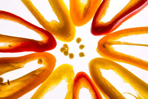 yellow, red and orange sliced hot peppers - Фото, зображення