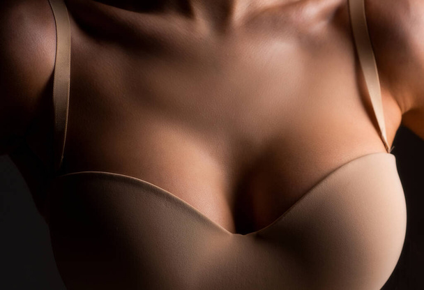Women with large breasts. Sexy breas, boobs in bra, sensual tits. Beautiful slim female body. Lingerie model. Closeup of sexy female boob in bra - Photo, Image