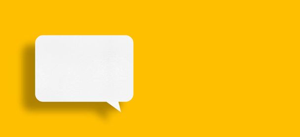 speech balloon shape white paper isolated on yellow background Communication bubbles. - Fotoğraf, Görsel