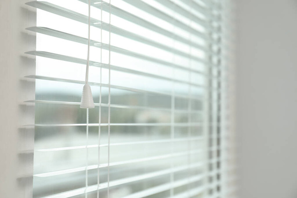 Closeup view of stylish horizontal window blinds - Zdjęcie, obraz