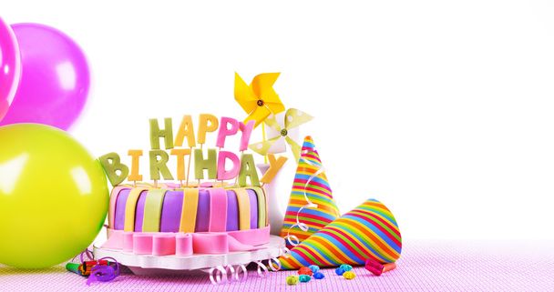 Delicious birthday cake on table on white background - Foto, Imagen