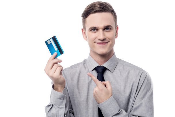 Businessman displaying his debit card - Fotó, kép