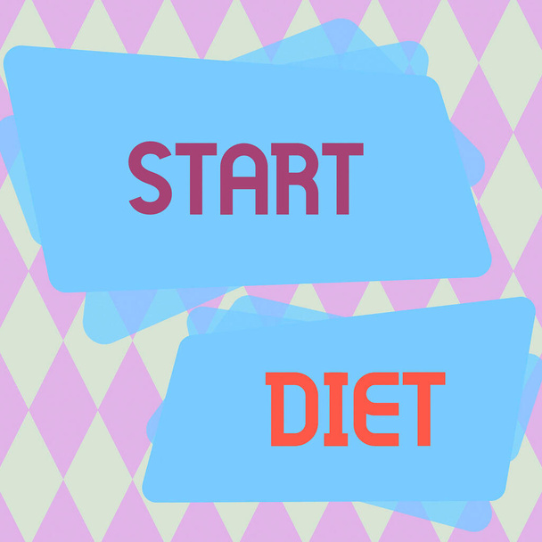 Teksti kuvateksti esittää Start Diet, Concept tarkoittaa käytännössä syödä ruokaa säännellyllä ja valvotulla tavalla - Valokuva, kuva