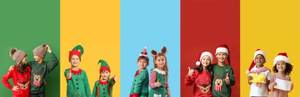 Collage con niños lindos en trajes de Navidad sobre fondo colorido - Foto, imagen