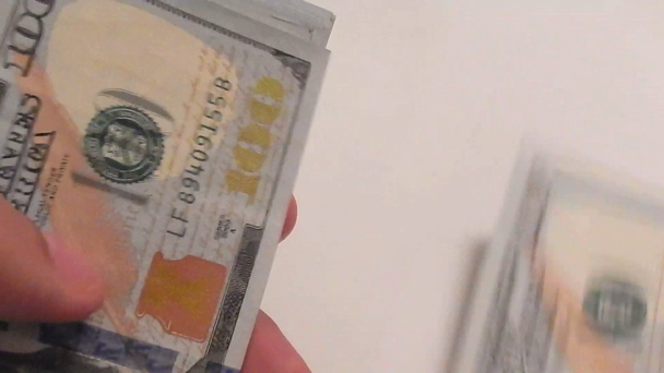 Counting a lot of one hundred dollar bills - Footage, Video
