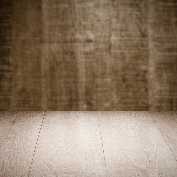 table with wooden wall - 写真・画像