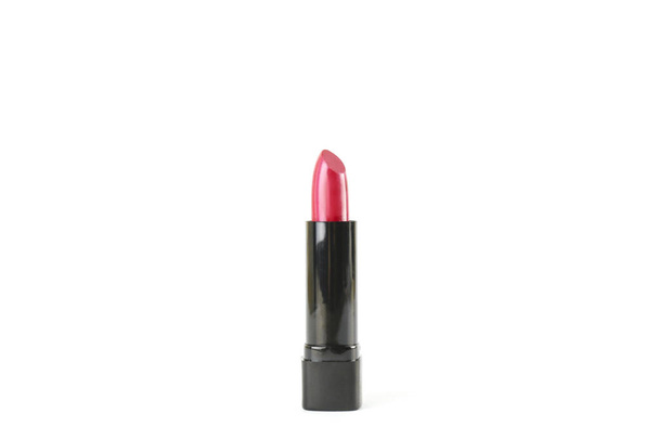 Close up shot of a single glossy lipstick isolated on white background with a lot of copy space for text. - Fotó, kép