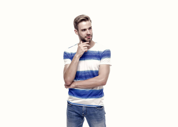 male summer casual fashion style. thoughtful guy has groomed hair isolated on white. confidence and charisma. sexy boy with trendy hairstyle wear shirt. handsome unshaven man with bristle. - Foto, afbeelding
