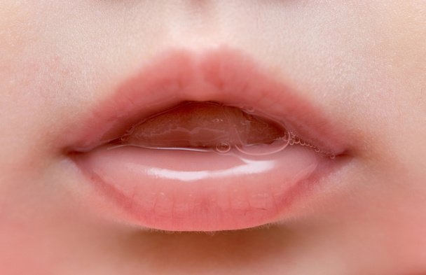 Gros plan des lèvres de bébé fille
 - Photo, image
