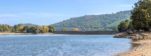 low water level in Morales reservoir, due to climate change, in Rozas de Puerto Real. Madrid. Spain - Photo, Image