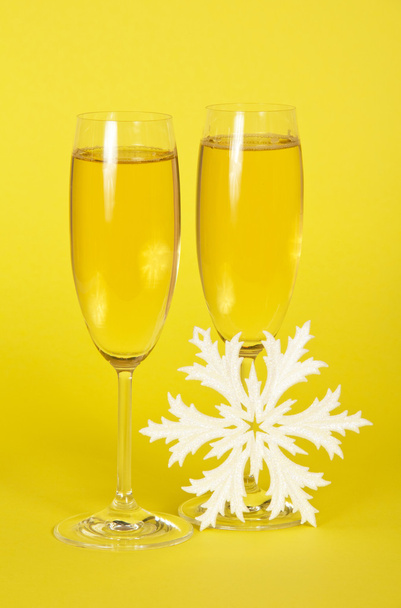Glasses with champagne and snowflake - Photo, image