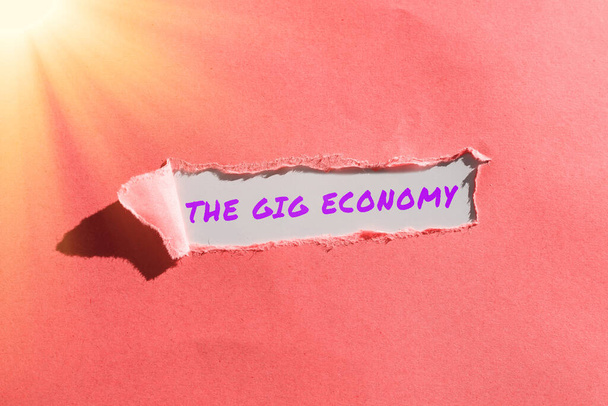 Text, der Inspiration zeigt Die Gig Economy, Konzeptfotomarkt der Kurzzeitverträge Freiberufler Zeitarbeit - Foto, Bild