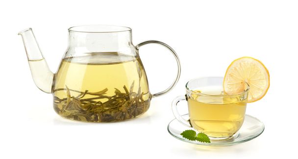 Tea in cup with leaf mint and lemon - Photo, image
