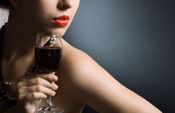 Woman with glass red wine - Photo, Image