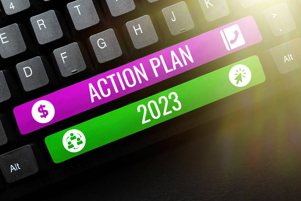 Señal de texto que muestra el Plan de Acción 2023, escaparate de negocios para hacer la lista contiene el número de cosas que se harán el próximo año - Foto, imagen