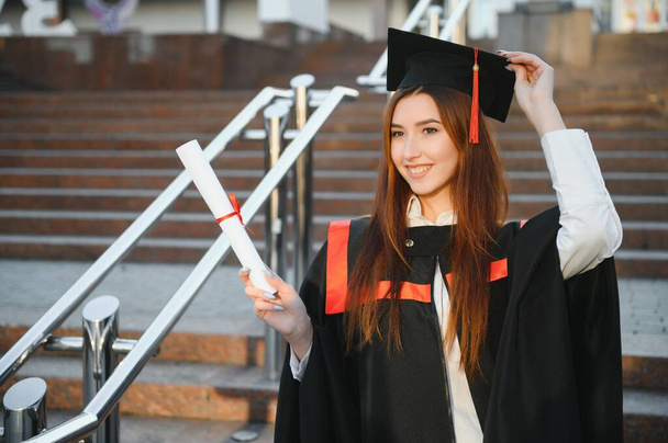 Woman portrait on her graduation day. University. Education, graduation and people concept - Foto, Bild