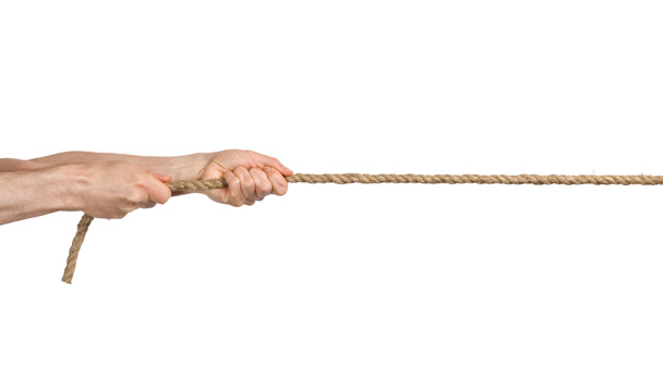 Hands pull a rope. - Photo, Image
