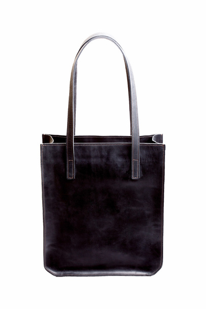 Большая кожаная сумка черной женщины
 - Фото, изображение