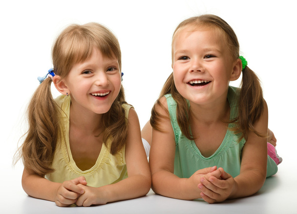 Two little girls are playing - Φωτογραφία, εικόνα