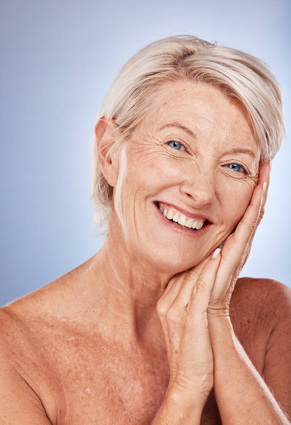 Senior woman, skincare and happy with cosmetics, health and wellness of face beauty against a grey studio background with mockup. Elderly model, portrait and skin makeup, cosmetic and healthy smile. - Foto, Imagen