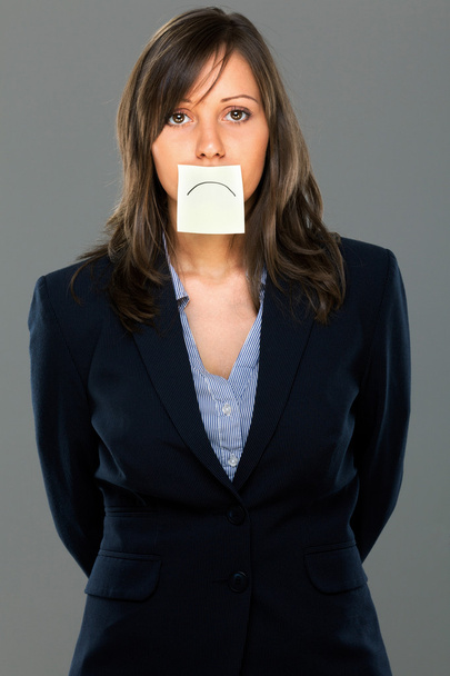Businesswoman with sticky note - Fotoğraf, Görsel