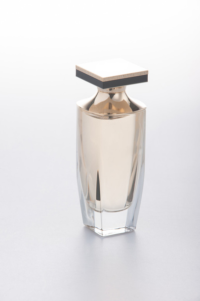 jar for a parfum costs on surface - Φωτογραφία, εικόνα