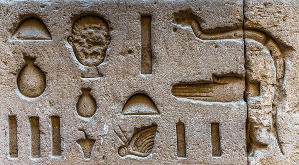 Egyptian hieroglyphs on the wall in the Sobek temple in Kom Ombo, Egypt - Photo, image