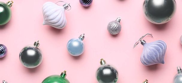 Many beautiful Christmas balls on pink background, flat lay - Фото, зображення