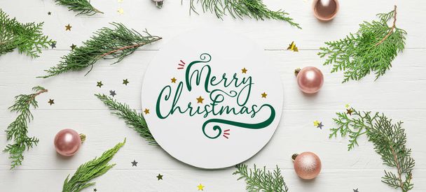 Christmas greeting card and decor on white wooden background - Photo, Image