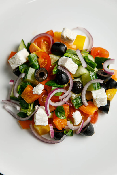 a delicious salad prepared in the restaurant by the chef - Photo, Image