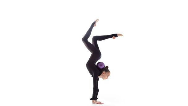Rhythmic gymnast isolated on white - Fotó, kép