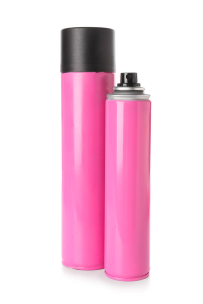 Vaaleanpunaiset pullot hiuslakkaa valkoisella taustalla - Valokuva, kuva