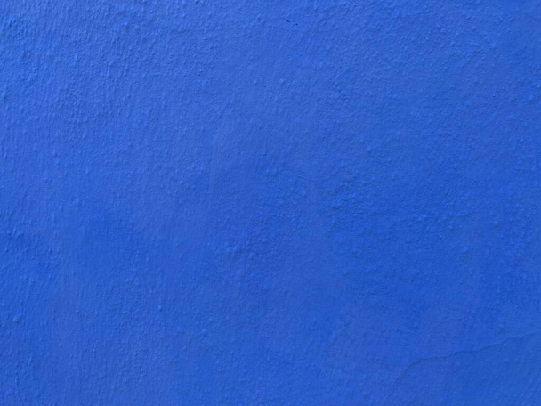 Bright blue wall textured background surface - Photo, Image