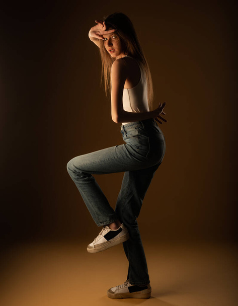 Attractive and beautiful young girl is doing some cool posing - Foto, afbeelding
