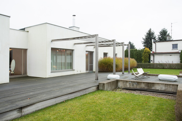 Enormous terrace outside designed residence - Foto, afbeelding