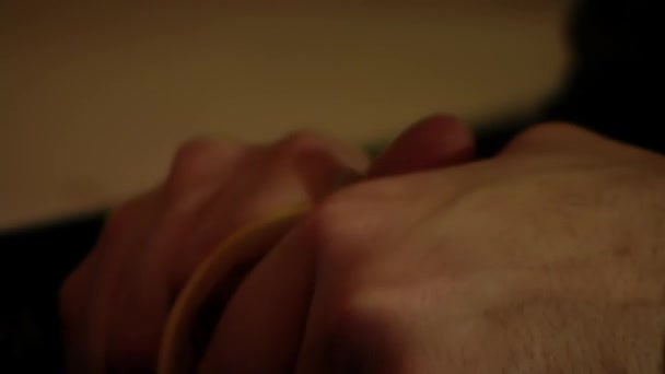 Hands of a Man Peeling an Orange. Close Up.  - Video