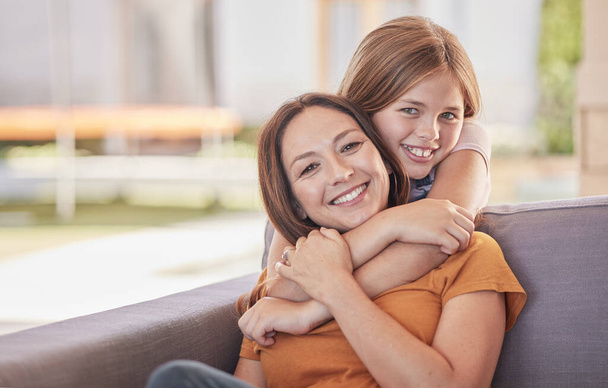 Portrait, family and mother with girl in on sofa, bonding and enjoying quality time together. Support, care and love of daughter or kid hugging mom on couch, smiling and laughing on weekend at house - Fotoğraf, Görsel
