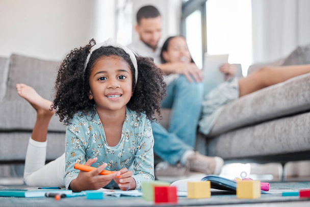 Family, learning and girl in living room drawing for kindergarten school homework or project. Portrait, art and education of creative kid coloring on paper with parents on the sofa in lounge of house. - Foto, imagen