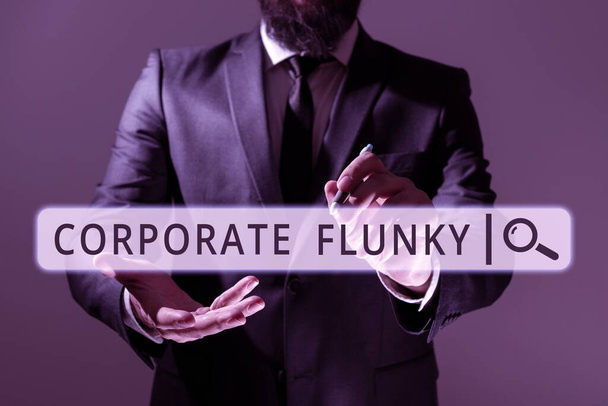 Handschriftliches Zeichen Corporate Flunky, Internet-Konzept jemand, der gehorsam für eine andere Person im Unternehmen arbeitet - Foto, Bild
