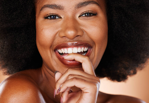 Black woman with natural smile, beauty portrait in studio and cosmetics skincare for face with healthy teeth. Happy african girl, afro hair care in Brazil and luxury makeup with mascara lashes. - Fotó, kép