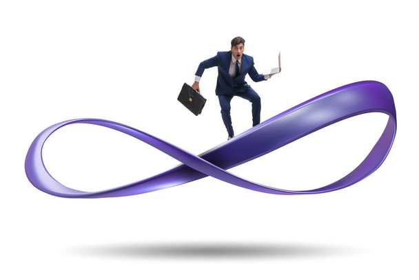 Бизнесмен бегает по бесконечному кругу - Фото, изображение