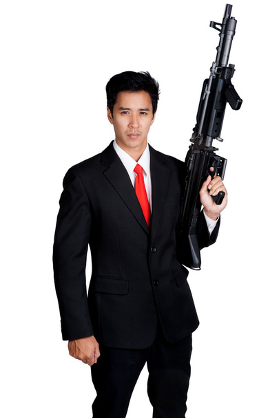 business man holding machine gun - Photo, Image