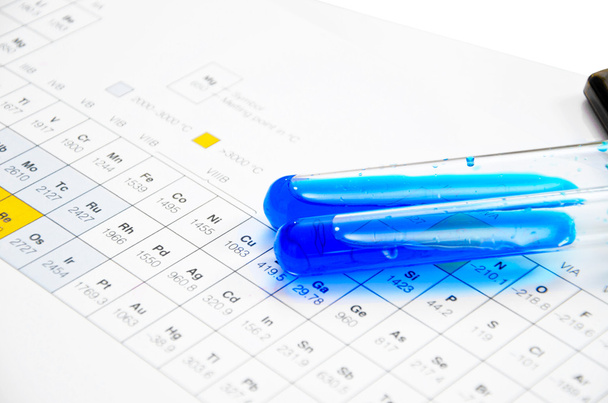 The lab or laboratory test tubes on periodic Table - Foto, Bild